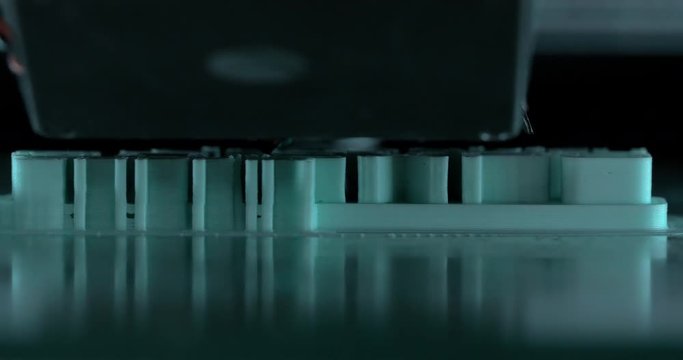 In ECC Sokolniki, Moscow at exhibition of 3D Expo seen how print head of 3D printer working on a print object. Printing technology