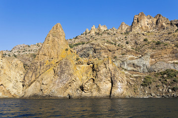 Fototapeta na wymiar Ancient rocks resembling dinosaurs.South-East Crimea.