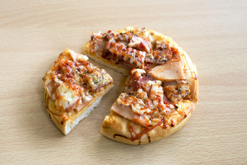 pizza on wooden table