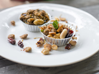 Snacks made from shells. Dried oysters on a white plate