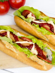 hot dogs on a wooden table