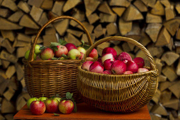 Red apples in wooden wicker basket