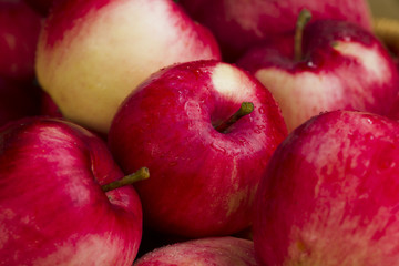 Red apples in wooden wicker basket