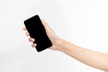 hand holding black phone isolated on white