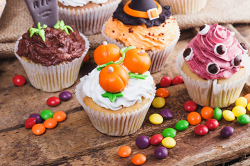 Halloween cupcakes with colored mastic decorations