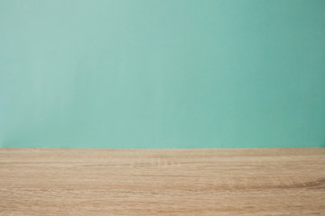 Vintage wood table in blue wall room.