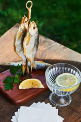 Felted Astrakhan roach served on a wooden stand with hook