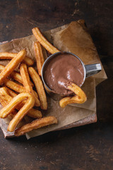 Traditional spanish churros with chocolate