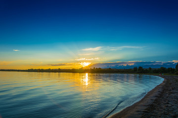Fototapeta na wymiar Sunset on lake Issyk-Kul, Kyrgyzstan.
