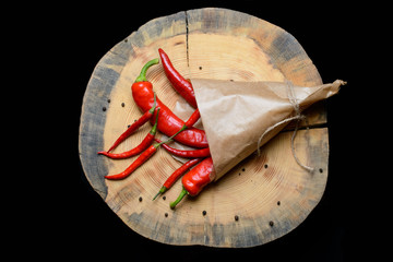 Red chilli papper in a paper bag