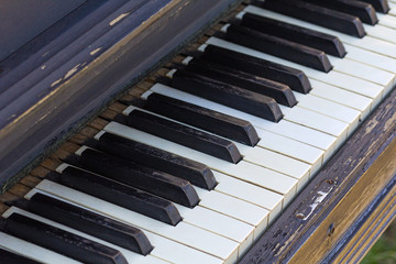 Old piano keys close up. Musical background