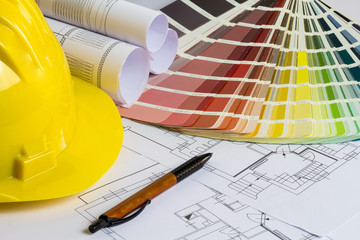 An office desk with the project papers