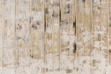 Beach sand on vintage planked wood background - layout with free text space. - obrazy, fototapety, plakaty