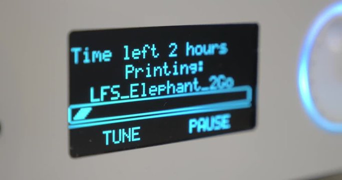 In ECC Sokolniki, Moscow at exhibition of 3D Expo seen electronic scoreboard with countdown to the end of work of 3D printer. Printing technology