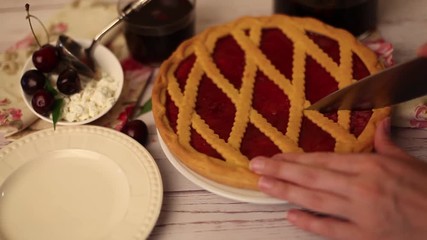 lattice pie cut hand knife with red jam cooking - Powered by Adobe