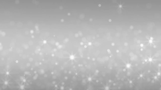 Falling silver stars and glitter particles. 4K seamless loop animation