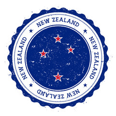 Grunge rubber stamp with New Zealand flag. Vintage travel stamp with circular text, stars and national flag inside it. Vector illustration.