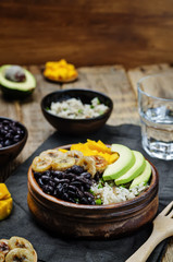black beans fried banana mango cilantro rice bowl