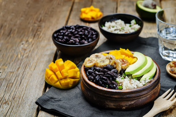 black beans fried banana mango cilantro rice bowl