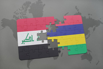 puzzle with the national flag of iraq and mauritius on a world map background.