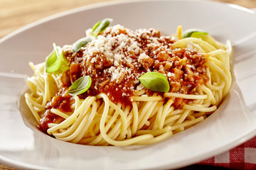 Plate of spaghetti Bolognese parmigiana