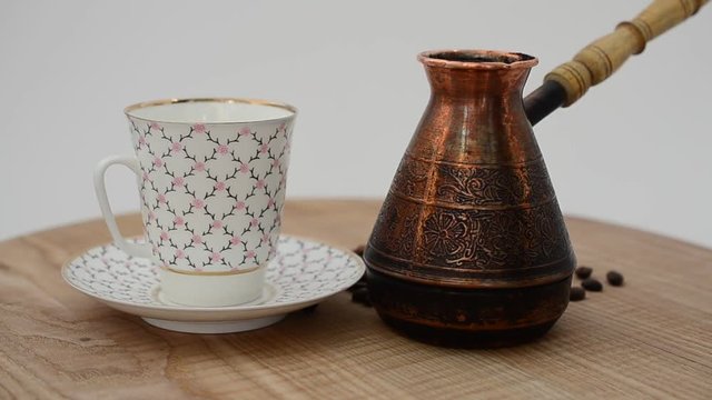 Coffee, coffee cup and grains.