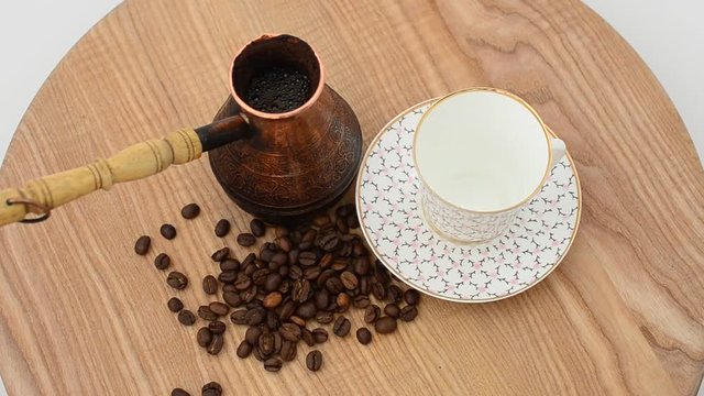 Coffee, coffee cup and grains.