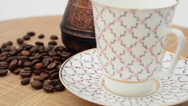 Coffee, coffee cup and grains.