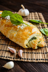 Savory strudel stuffed with spinach, Roquefort, Feta cheese and garlic