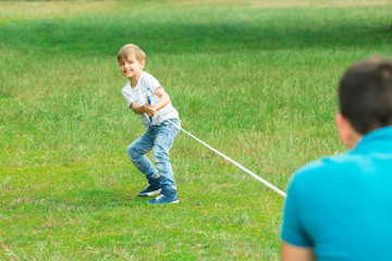 Kid Playing Tug Of War