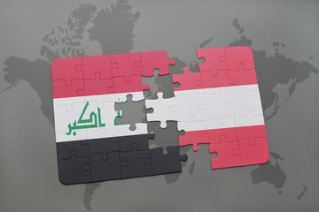 puzzle with the national flag of iraq and austria on a world map background.