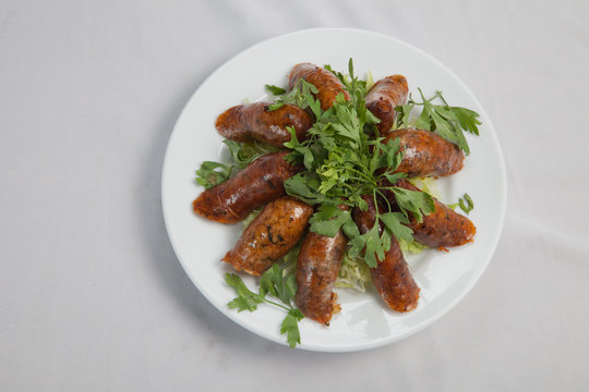 Rice-stuffed sausages called Mombar