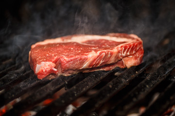 Beef steak fried on a grill