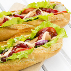 hot dogs on a wooden table