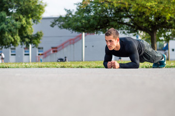 Man training at sunny autumn day. Healthy lifestyle concept.