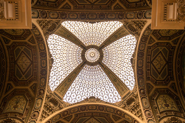 Inside the main post office in the old town of Barcelona. View to the fantastic roof with the stained-glass dome. The Edifici central de Correus i Telegrafs, an important cultural building in the city