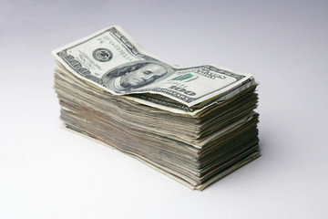 Stack of one hundred dollar bills