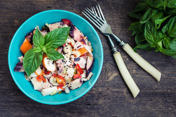 Fresh salad with seafood and vegetables