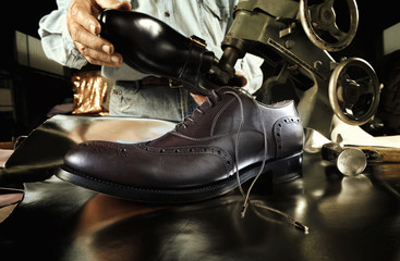 craftsman making luxury handmade man shoes