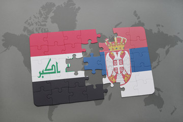 puzzle with the national flag of iraq and serbia on a world map background.