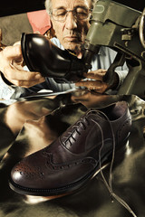 craftsman making luxury handmade man shoes