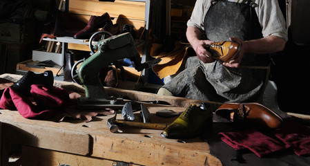 craftsman making luxury handmade man shoes