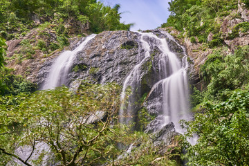 Fototapeta na wymiar waterfall in the tropical rain forest. Khong Lan waterfall, Thailand