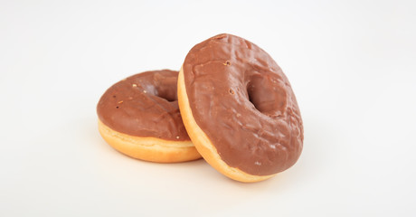 Chocolate donuts on white background