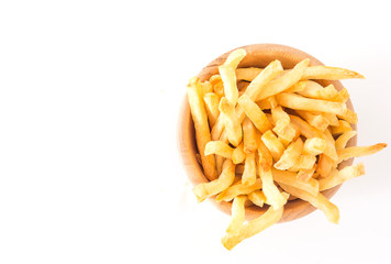 French fries in wood bowl on white background. Top view with copy space