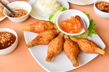 Vietnamese-Style Fried Shrimp with Sugar Cane Isolated on a White Plate