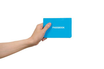 human hand holding blue passbook on isolated white background.