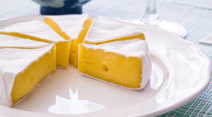 Yellow cheese on a plate