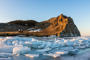 Ice hummocks on a background of lake depressions and Cape Uzury
