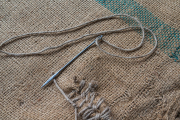 sewing needle put on sack